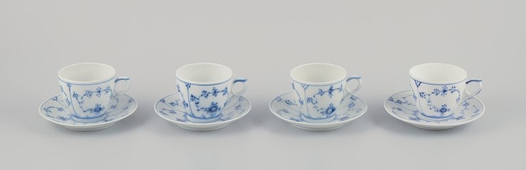 Royal Copenhagen Blue Fluted Plain. A set of four coffee cups with saucers. 1969-1974.: Royal Copenhagen Blue Fluted Plain. A set of four coffee cups with saucers. Model number 1/80. Dating: 1969-1974. Marked. Second to fourth factory quality. Perfect condition. Cup: Diameter 7.0 cm with