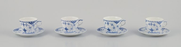 Royal Copenhagen Blue Fluted Half Lace. A set of four coffee cups with saucers. 1930s: Royal Copenhagen Blue Fluted Half Lace. A set of four coffee cups with saucers. Model number: 1/719. Dating: Approximately 1930 (3) and 1937. In perfect condition. Marked. Second factory quality. Coff