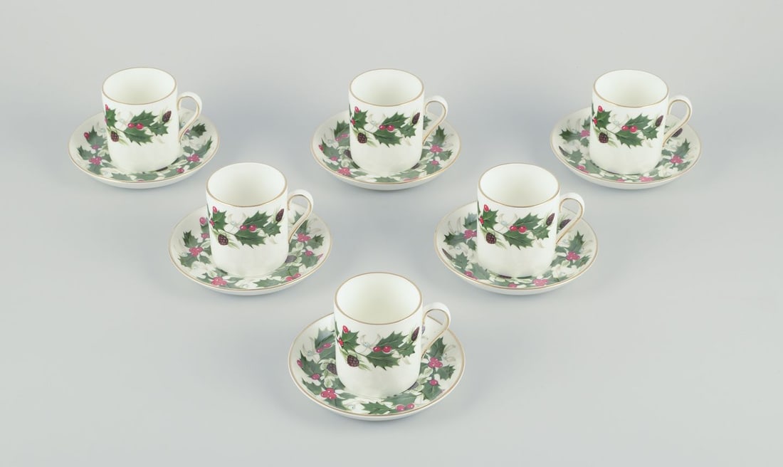Royal Tuscan, England. A set of six cups with handles. "Noel" series. 20th C.: Royal Tuscan, England. A set of six cups with handles. From the "Noel" series. 20th century. Perfect condition. Marked. Cup: Height 6,3 cm. x diameter 5.7 cm. without handle Saucer: 11,8 cm. Reserve: