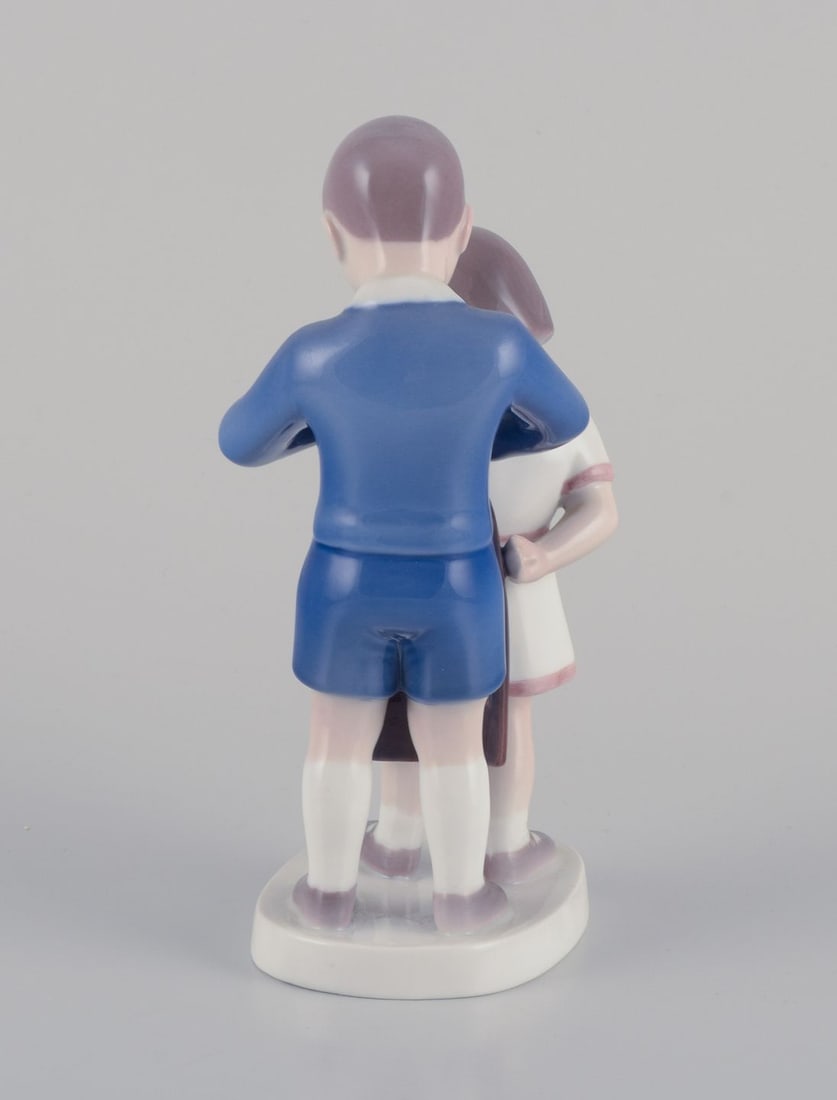 Bing & Grondahl, porcelain figurine. Boy helping girl with her jacket. Ca. 1930s - 5