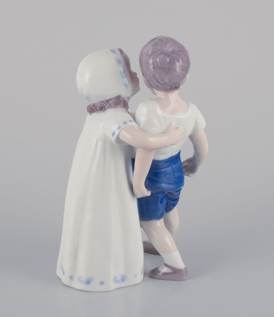 Bing & Grondahl, porcelain figurine of a little girl and boy. Approx. 1930s - 5