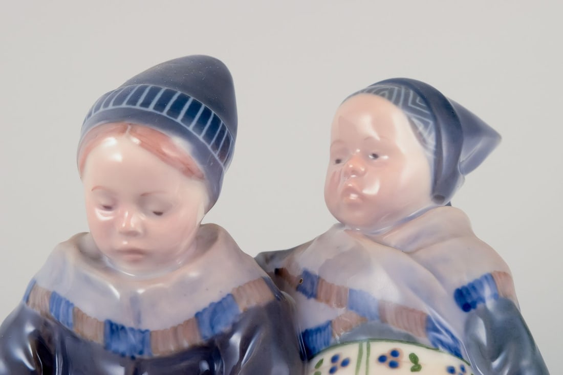 Royal Copenhagen figurine in porcelain. Two "Amager" girls in regional costume. Dated 1956 - 6