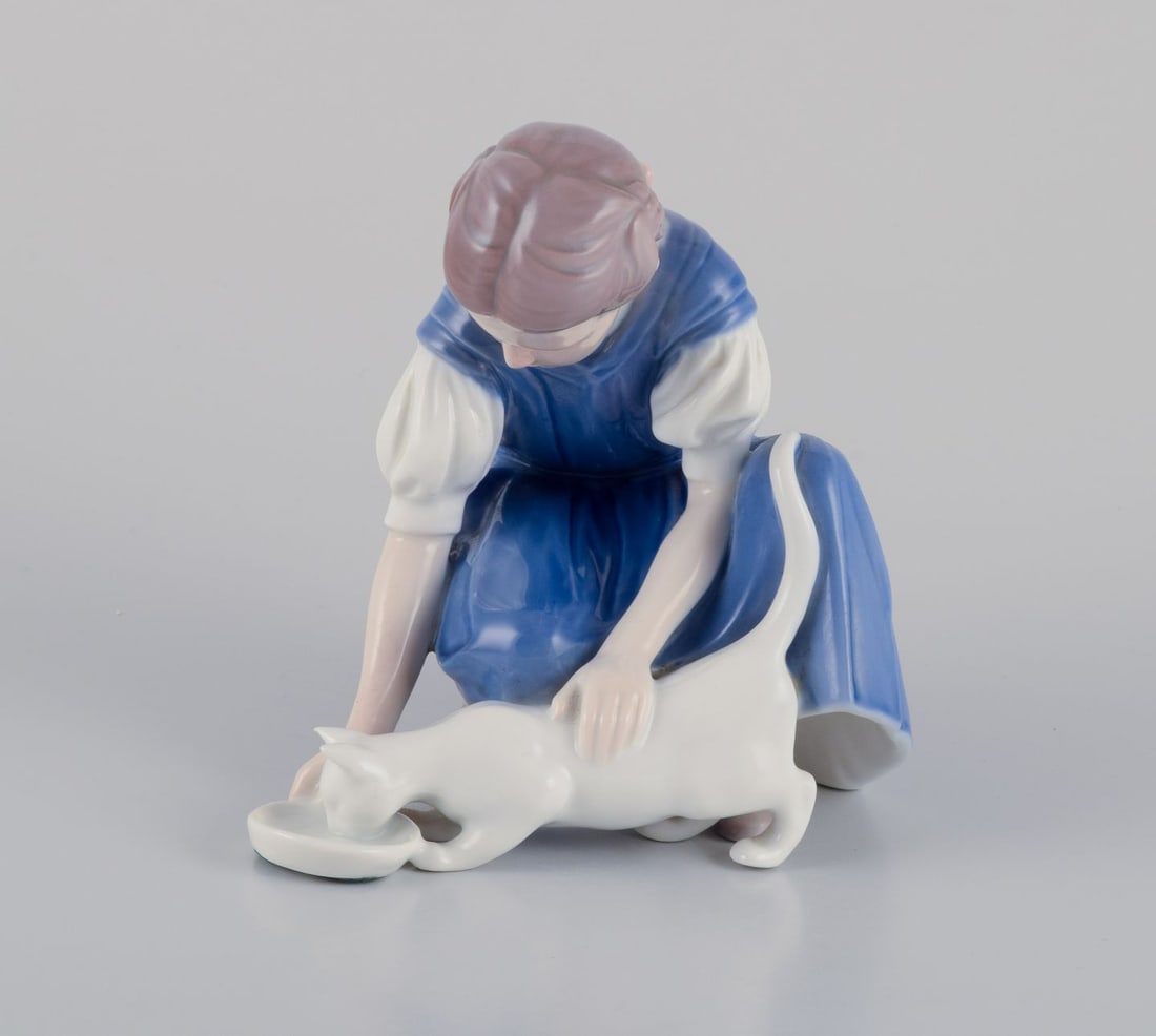 Bing & Grondahl porcelain figurine. Girl with a cat. Approx. 1970s: Bing & Grondahl porcelain figurine. Girl with a cat. Approx. 1970s Model number: 1745. In perfect condition. Marked. First factory quality. Dimensions: W 15.5 cm. x H 14.0 cm. Reserve: $140.00 Shippin