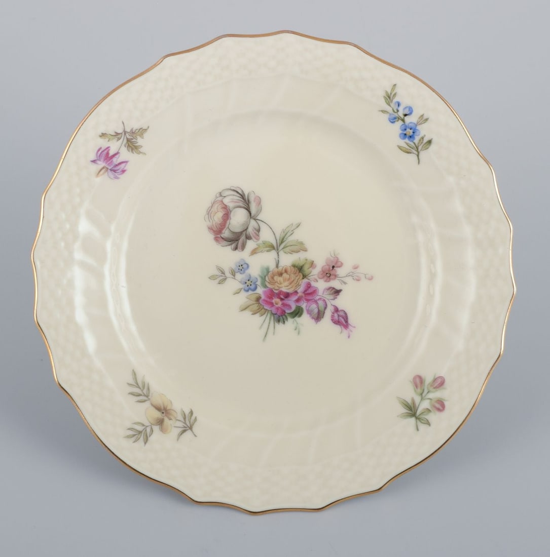 Royal Copenhagen, "Frijsenborg". Thirteen plates decorated with floral motifs, gold rim. 1950s. - 6