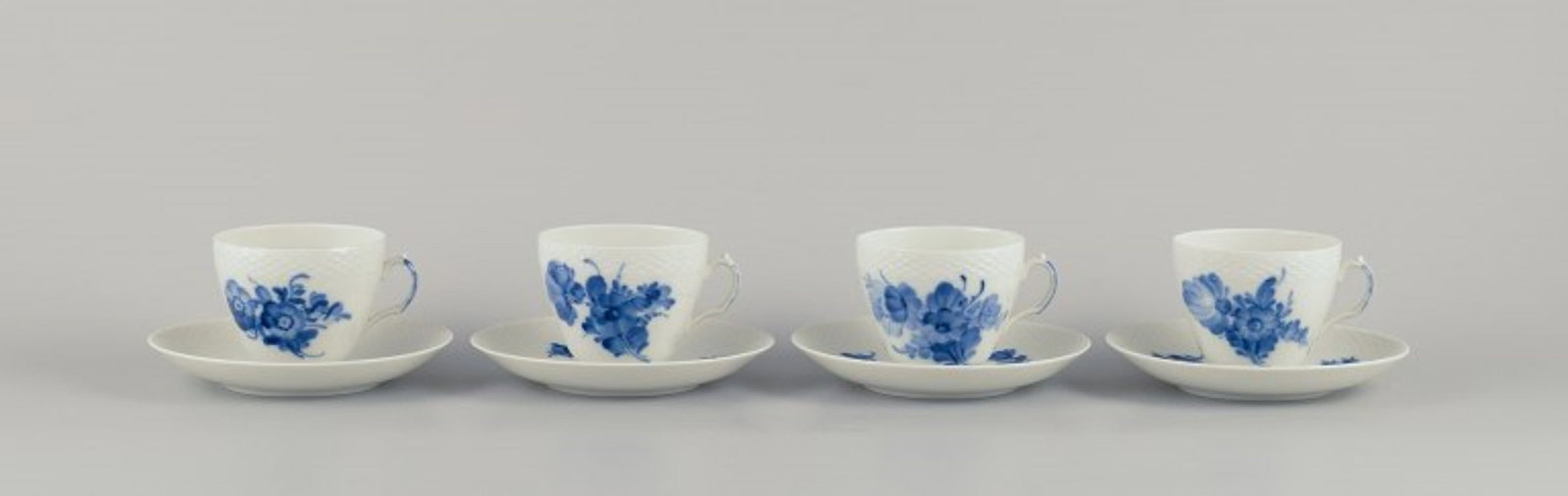 Royal Copenhagen, Blue Flower Braided. Four coffee cups with saucers in porcelain.: Royal Copenhagen, Blue Flower Braided, four coffee cups with saucers. Model number: 10/8261 Dating: 1965-1966 Second factory quality. In perfect condition. Marked. Cup: Diameter 8.0 cm without handle