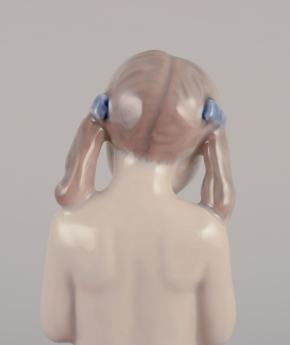 Royal Copenhagen porcelain figurine of a girl with a rabbit. 1980-1984. - 7