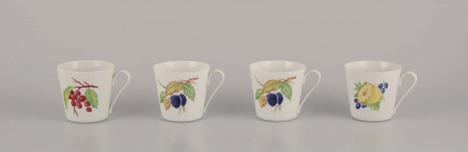 Danild/Lyngby, Denmark. "Picnic". Four porcelain coffee cups. 1960s/1970s.: Danild/Lyngby, "Picnic". Four porcelain coffee cups. 1960s/1970s. Marked. Perfect condition. Dimensions: Diameter 7.5 cm (without handle) x Height 7.0 cm. The Danild No. 50 "Picnic" fruit and