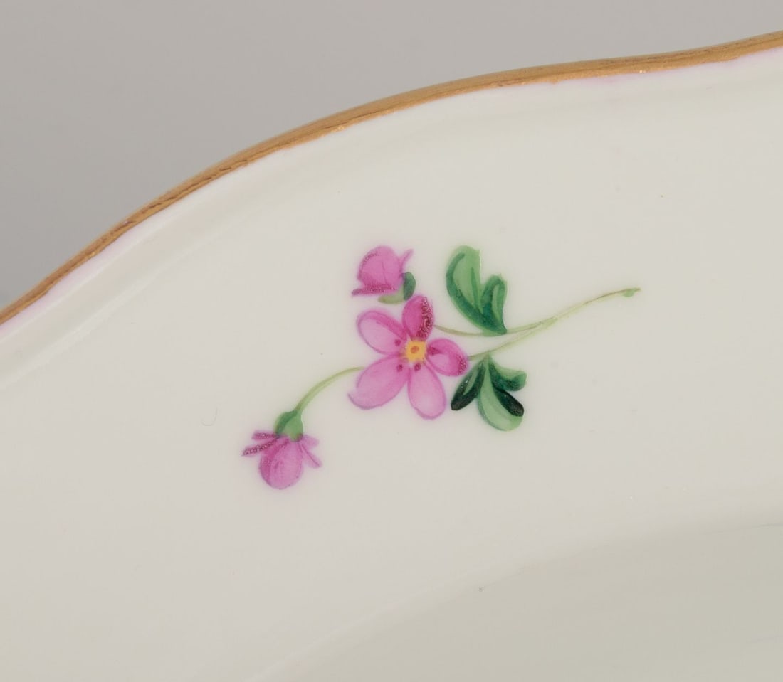 Meissen, Germany. A set of four deep plates in porcelain with polychrome floral motifs and gold rim. - 7