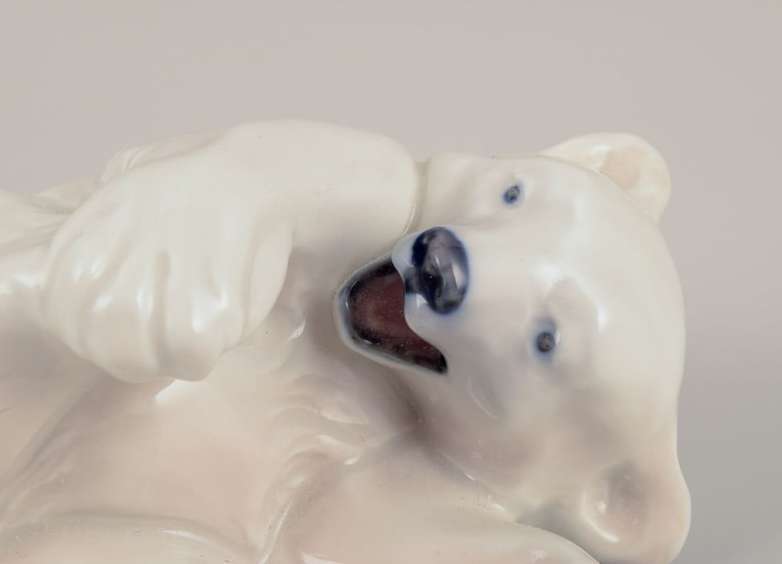 Royal Copenhagen, Denmark. Two porcelain figurines of a polar bear cub and a brown bear cub. - 6