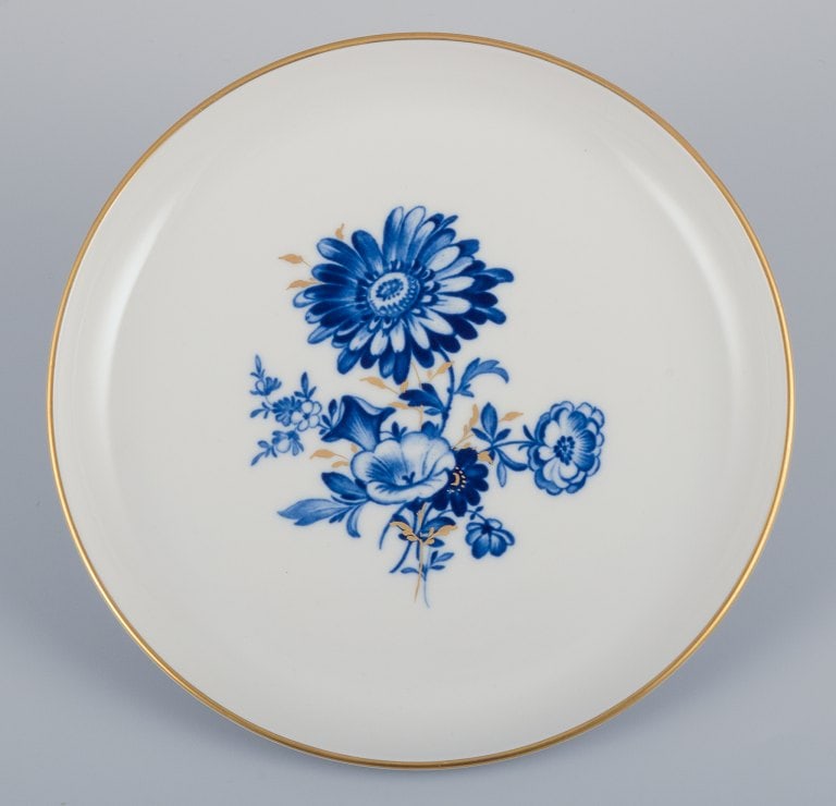 Meissen, Germany. Two plates. Hand-decorated with blue floral motifs, gold rim. - 2