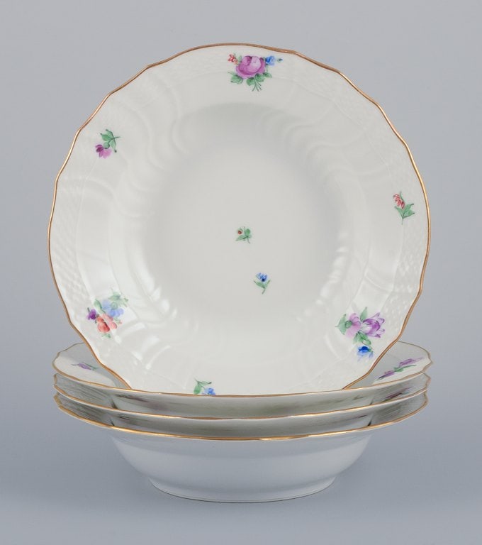 Royal Copenhagen Saxon Flower. Four deep plates in porcelain. Hand-painted with polychrome flowers.: Royal Copenhagen Saxon Flower. Four deep plates in porcelain. Hand-painted with polychrome flowers. Gold rim. Extra deep model. Model: 482/1614 Early 1900s. Marked. In perfect condition. Second