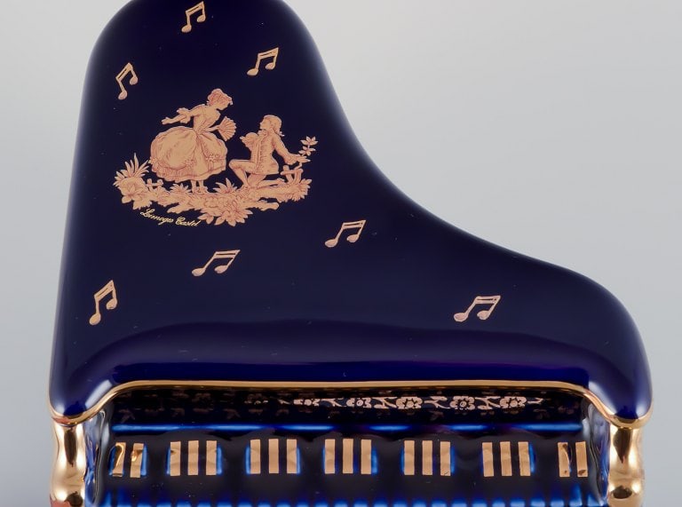 Limoges, France. Four porcelain musical instruments decorated with 22-karat gold leaf and beautiful - 4