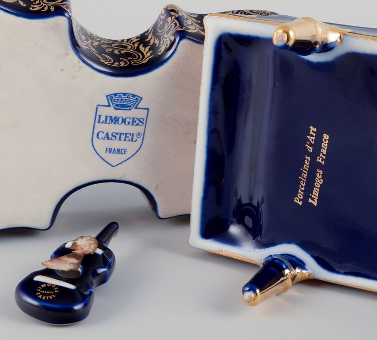 Limoges, France. Four porcelain musical instruments decorated with 22-karat gold leaf and beautiful - 9