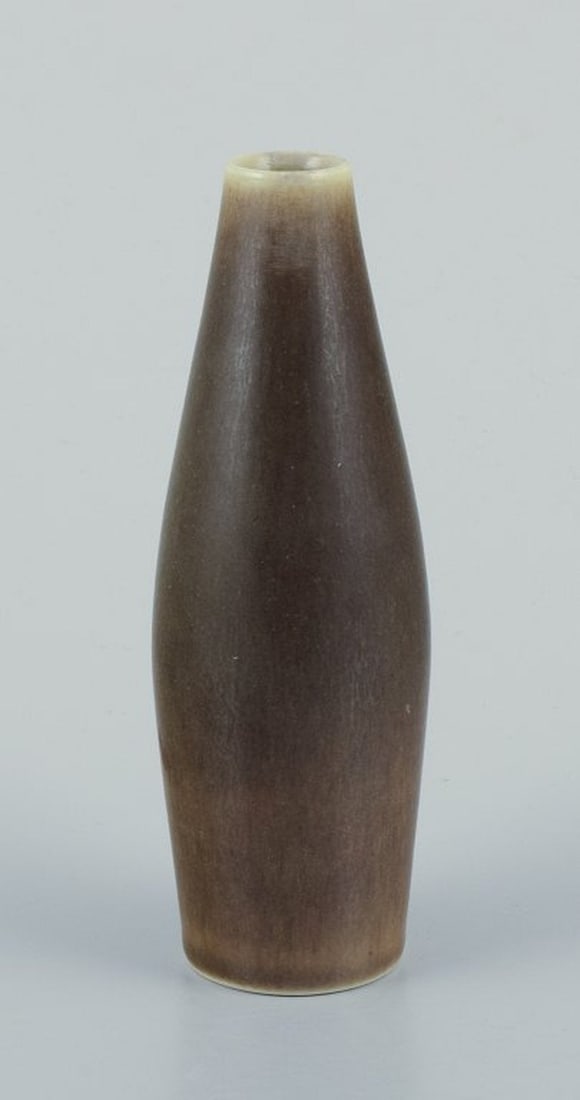 Per Linnemann-Schmidt for Palshus, Denmark. Slender ceramic vase with hare fur glaze. Circa: Per Linnemann-Schmidt (1912-1999) for Palshus, Denmark. Slender ceramic vase with hare fur glaze in greenish shades. Circa 1960s/70s. Marked. Perfect condition. Dimensions: H 13.0 cm. x D 4.5 cm.; Per