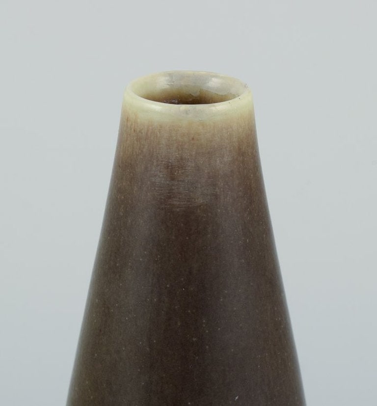 Per Linnemann-Schmidt for Palshus, Denmark. Slender ceramic vase with hare fur glaze. Circa - 2