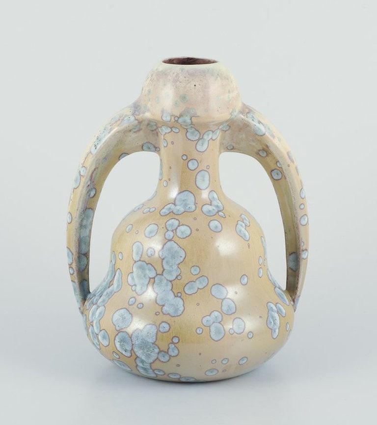 Desvres Fourmaintraux Delassus, France. Art Nouveau ceramic vase with handles. Circa 1930s.: Desvres Fourmaintraux Delassus, France. Art Nouveau ceramic vase with handles. Crystal glaze. Ochre-yellow glaze. Circa 1930s. Marked. in excellent condition with minimal and insignificant firing