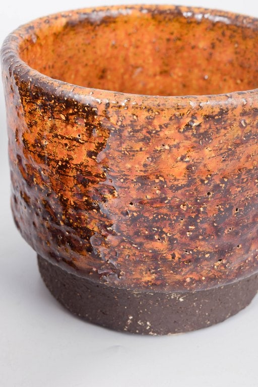 Hegnetslund, Scandinavia. Set of three stoneware plant pots in orange and brown tones. Approx. - 3