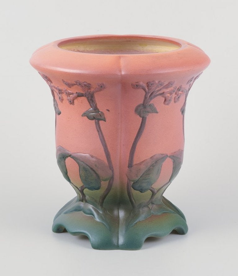 Ipsens, Denmark. Ceramic vase with floral motifs in orange and green glaze. 1920s/1930s. - 2