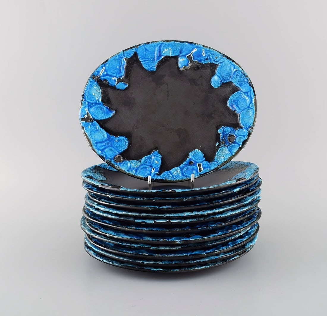 French ceramist. Twelve lunch plates in glazed stoneware. Beautiful glaze in azure shades. Unique,: French ceramist. Twelve lunch plates in glazed stoneware. Beautiful glaze in azure shades. Unique, high-quality ceramics. Mid-20th century. Measures: 22 x 19 cm. in excellent condition. Reserve: $329.
