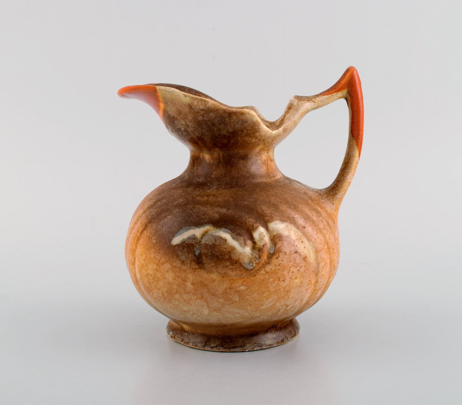 Danish ceramist. Two unique jugs in glazed stoneware. 1960s / 70s. - 2