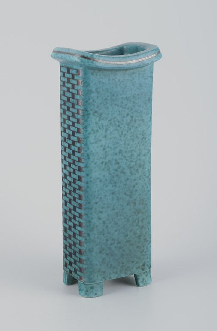 Wilhelm Kage for Gustavsberg, Sweden. Tall square Art Deco ceramic vase on feet. Mid 20th century.: Wilhelm Kage for Gustavsberg, Sweden. Tall square Art Deco ceramic vase on feet. Mid 20th century. Rare model. Painted with geometric pattern in silver. Perfect condition. Marked. Dimensions: H 29.0 c