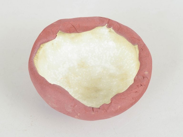 Christina Muff, Danish contemporary ceramicist (b. 1971). Tiny, one of a kind red stoneware bowl on - 2