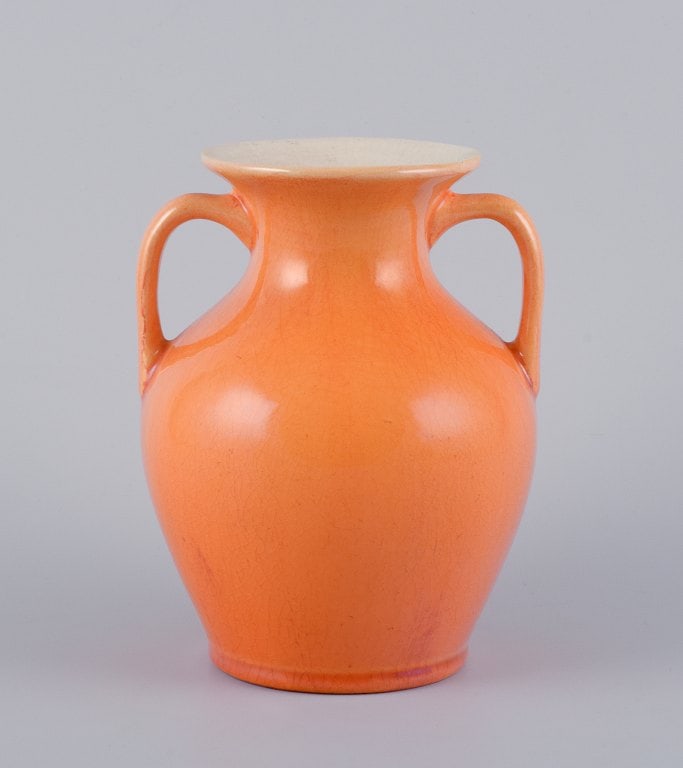 Rorstrand, Sweden, earthenware vase with handles in uranium yellow glaze.: Rorstrand, Sweden, earthenware vase with handles in uranium yellow glaze. Early 20th century. Marked. in excellent condition. Dimensions: H 14.5 cm x D 12.0 cm. Reserve: $168.00 Shipping: Domestic: