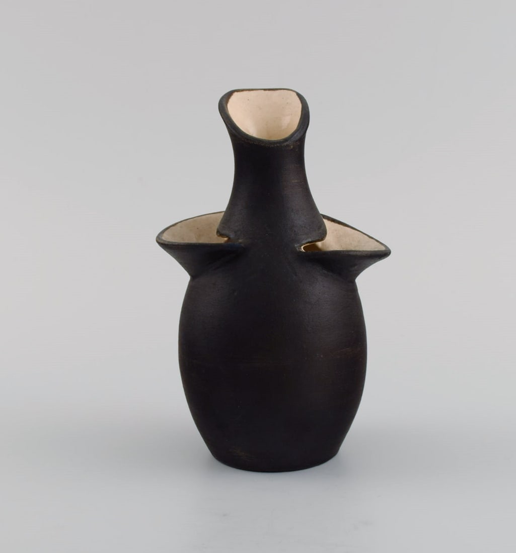 German studio ceramicist. Unique vase in glazed stoneware. 1960 / 70s.: German studio ceramicist. Unique vase in glazed stoneware. 1960 / 70s. Measures: 14.5 x 9 cm. in excellent condition. Stamped. Reserve: $140.00 Shipping: Domestic: Shipping rates are determined by des