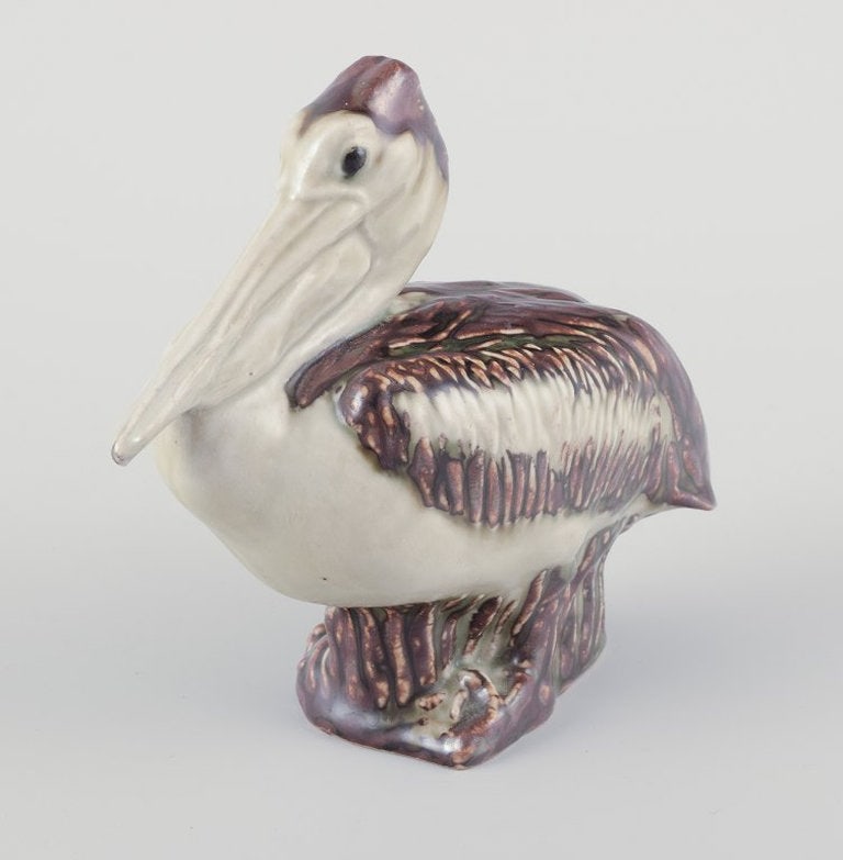 Jeanne Grut for Royal Copenhagen. Ceramic pelican figurine. Mid-20th century. - 5
