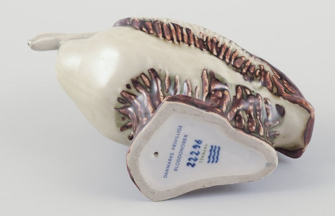 Jeanne Grut for Royal Copenhagen. Ceramic pelican figurine. Mid-20th century. - 6
