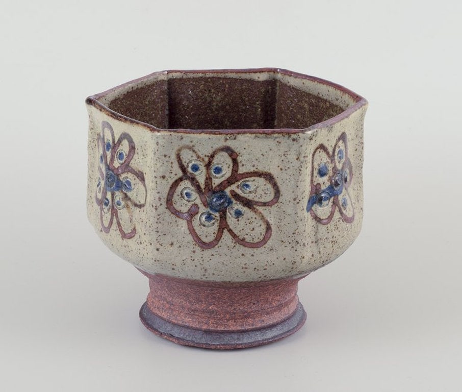 Birgit Krog, Danish ceramist. Unique hexagonal ceramic vase. Raku technique. Approximately 1970s.: Birgit Krog, Danish ceramist. Unique hexagonal ceramic vase. Raku technique. Glazed and unglazed. Floral motifs. Brown and sand-coloured tones. Approximately 1970s. Signed. in perfect condition. Dimen