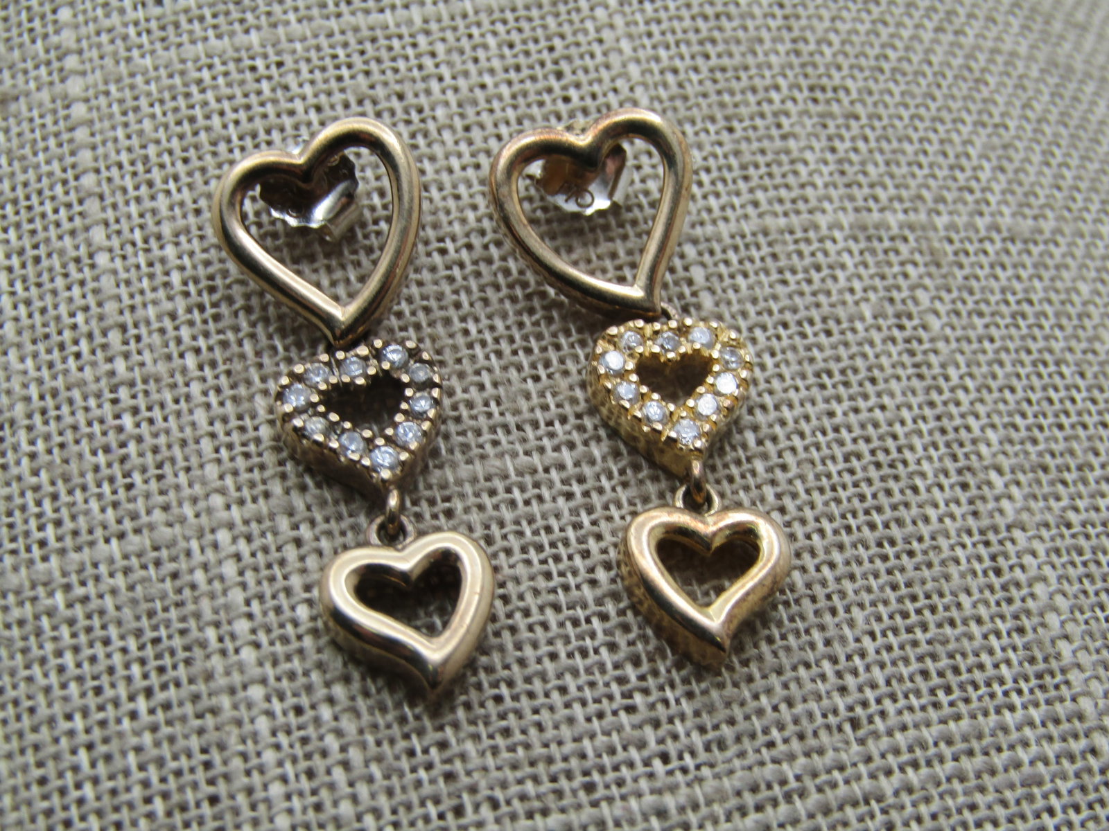 Vintage Sterling Vermeil CZ Heart Earings, Triple Drop, Pierced, Signed: Title: Vintage Sterling Vermeil CZ Heart Earings, Triple Drop, Pierced, Signed Description: Vintage Sterling Vermeil CZ Heart Earings, 1980's-1990's. Triple Drop, Pierced, Signed with what looks like 