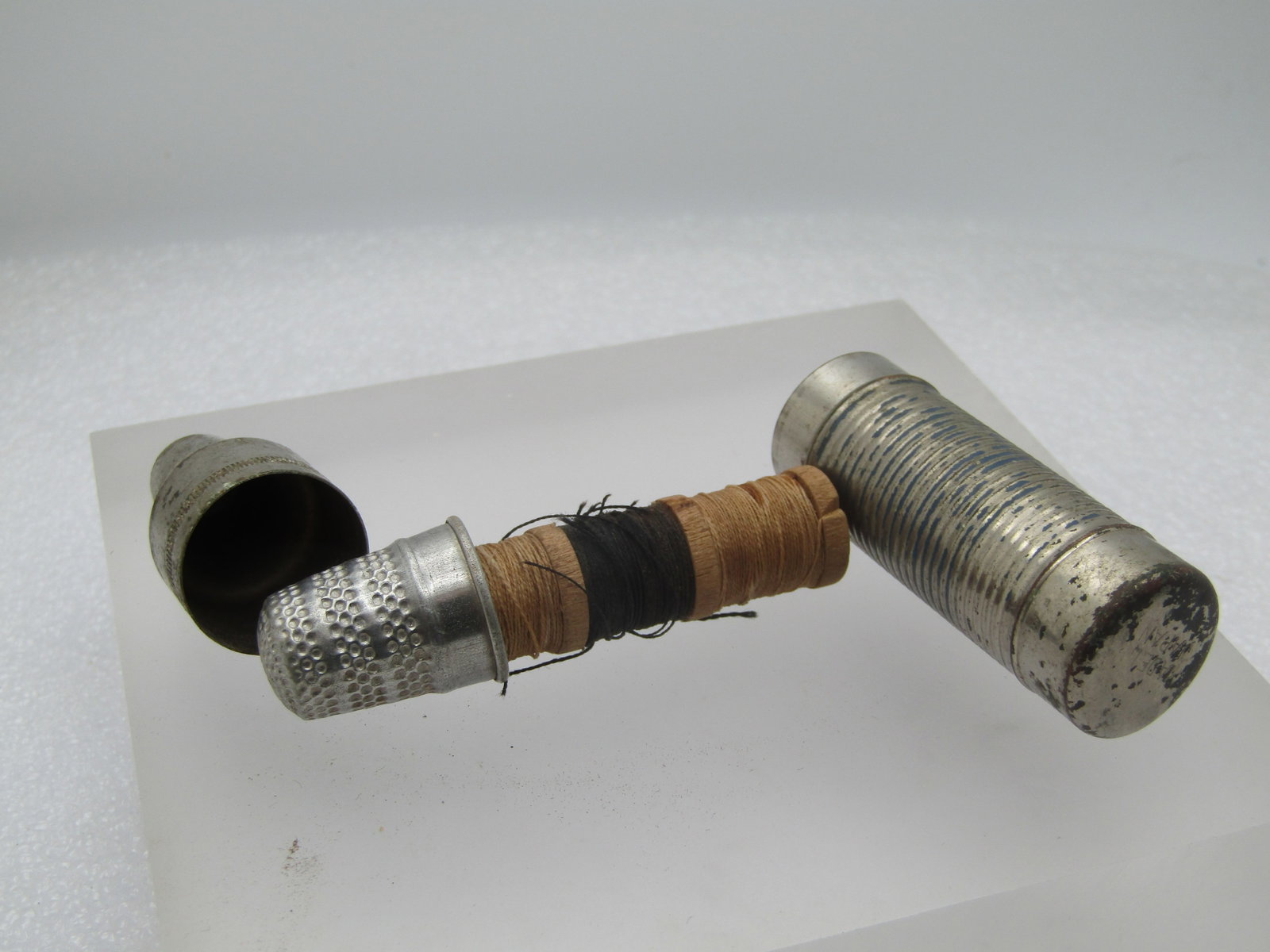 Vintage Sewing Kit in Thermos Like Tin, 1930's-1940's, possibly German. It is appx. 2.75" tall and - 3