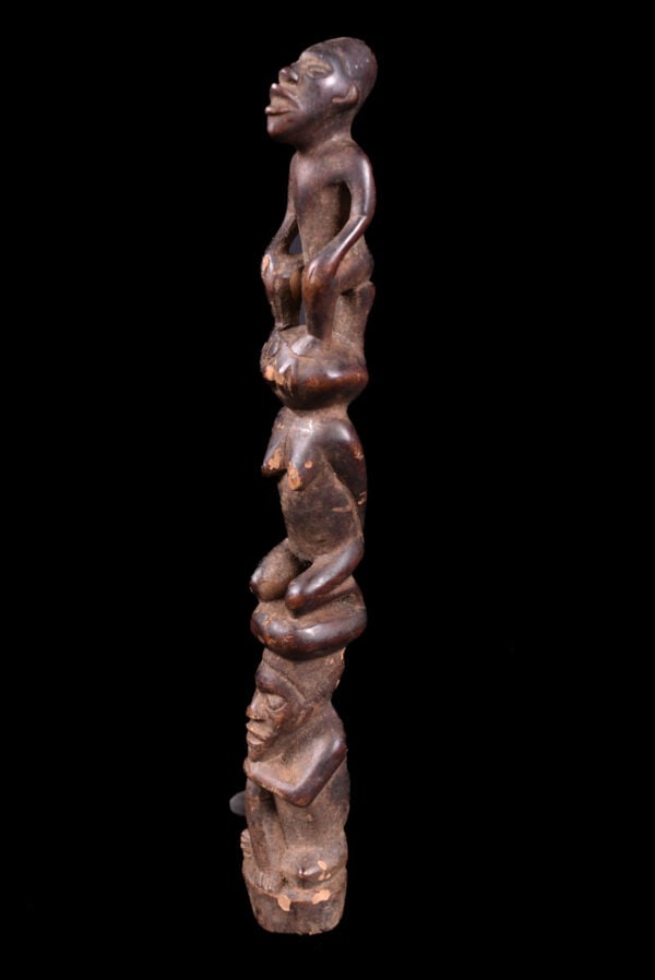 Figure – Wood – Bakongo Vili – Congo: Stylistic Bakongo Vili ancestor figure from Congo. Three figures are sitting on top of each other. Powerful appearance with with a great aged patina with clear traces of wear and tear. Provenance: