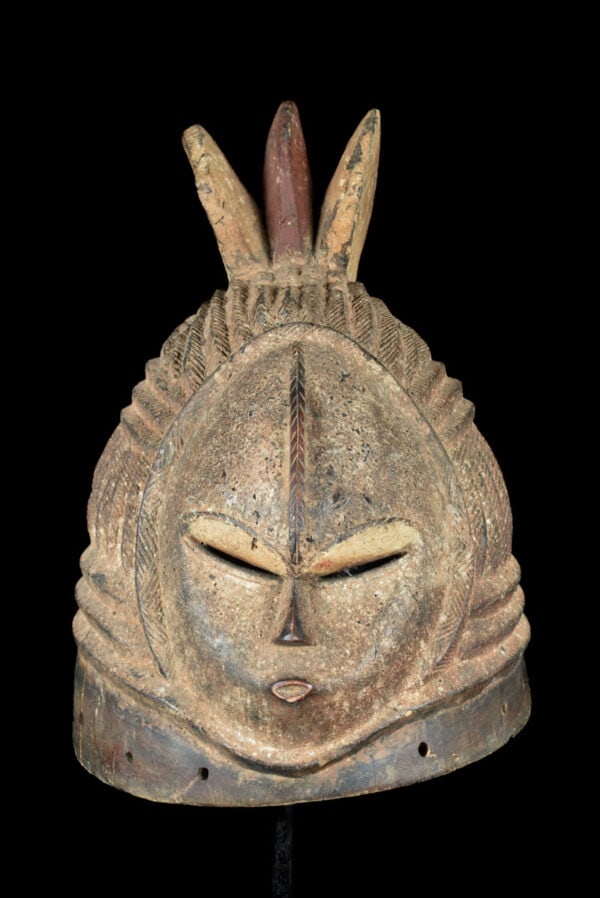 Helmet mask - wood - Mende - Sierra Leone: Impressive janus helmet mask with double faces. Large piece, total weight 4500 gram. A beautiful helmet mask from the Mende people living in Liberia and Sierra Leone. As symbol of idealized feminine b