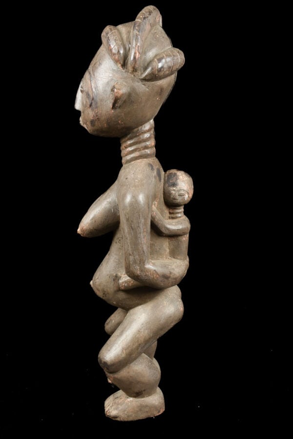Maternity Figure – Wood – Asante – Ghana: Maternity figures from the Asante tribe of Ghana. Exhibiting a wide diversity in size, symbolism, intimacy and style. African maternity figures depict the ideals of beauty, fertility, character and
