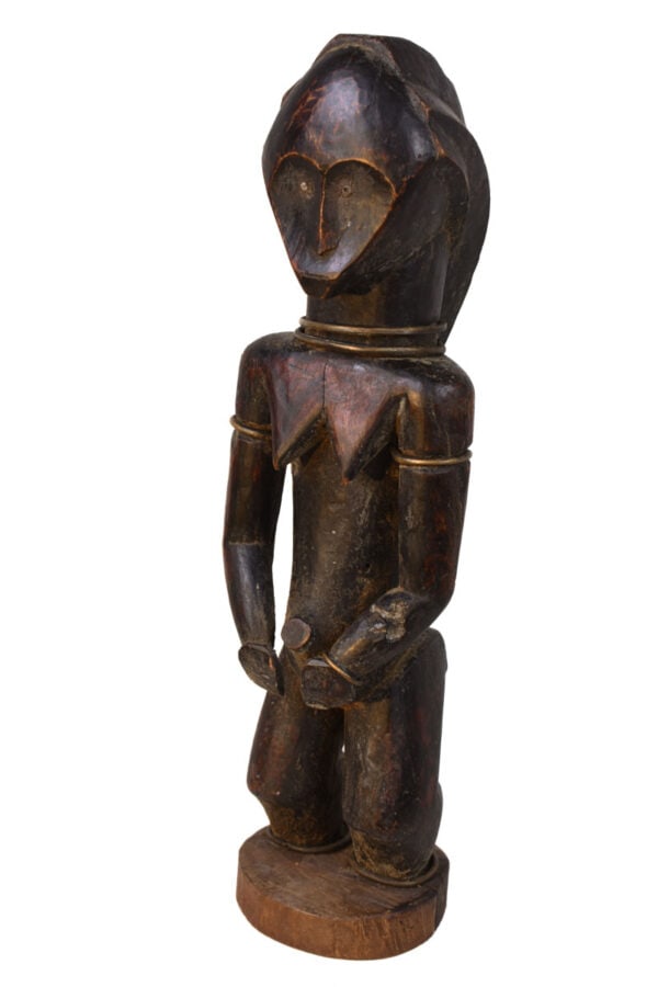 Ancestor Figure - Wood - Sukuma - Tanzania: Powerfull and rare Fang Okak figure form Gabon. The Fang peoples of Gabon believed that ancestral relics held great spiritual power. Byeri was a Fang association devoted to the veneration of lineage
