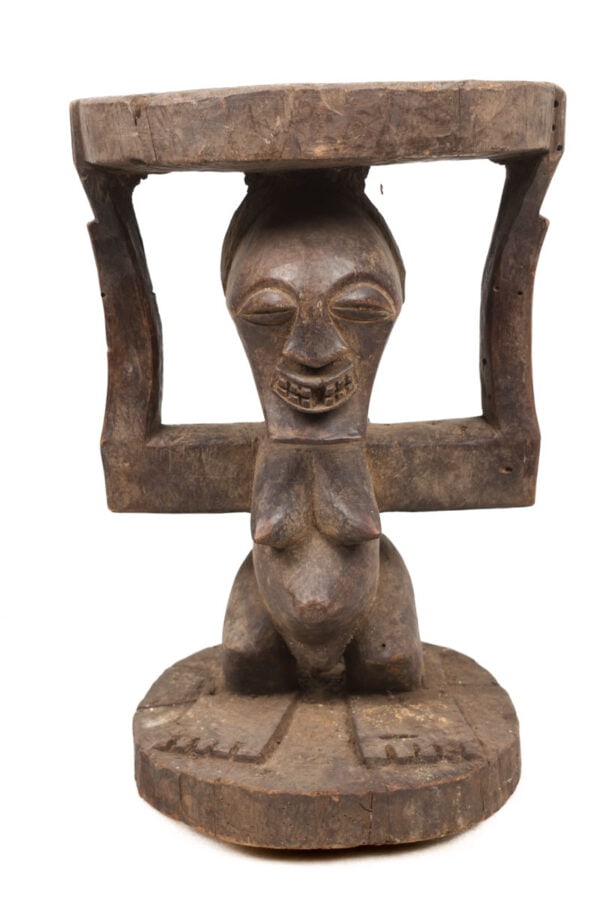 Stool - Wood - Songye - DR Congo: Authentic wooden seat from the Songye tribe of DR Congo. In many cultures throughout the southeastern region of the Democratic Republic of Congo the seats of leaders are important symbols of power and