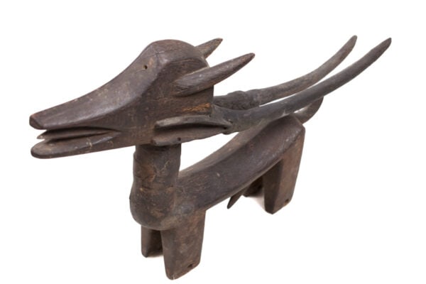 Ci-wara Headdress - Wood - Bambara - Mali: Bambara carvers have established a reputation for the zoomorphic headdresses worn by Chi-Wara society members. Although they are all different, they all display a highly abstract body, often