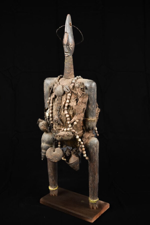 Fertility Doll – Wood, Shells, Beads – Namji – Cameroon: Great fertility doll from the Namji people of Cameroon. The doll represents the child desired by everyone, and is at the same time a “women’s fetish doll” which has to ensure their