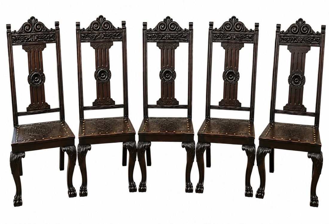 Antique Jacobean Revival Dining Chairs, Set of 5, Carved Wood & Embossed Leather: Elevate your dining space with this striking set of five Jacobean Revival dining chairs, showcasing intricate hand-carved details and richly embossed leather seats. Each chair features an ornate