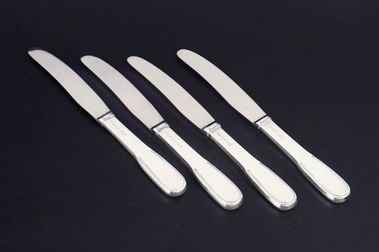 Evald Nielsen, Denmark. Lunch knives, set of four in sterling silver and stainless steel. Approx.: Title:Evald Nielsen, Denmark. Lunch knives, set of four in sterling silver and stainless steel. Approx. 1930s. Description:Evald Nielsen lunch knives, set of four. Model number 14. Elegant lunch knive