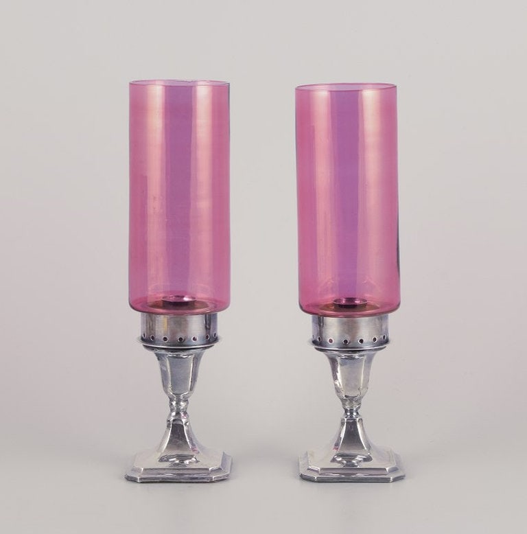 A.J. Pepper & Co. Ltd., United Kingdom. Pair of 'Hurricanes' candlesticks in silver and violet (1 of 8)