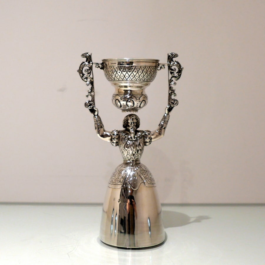 19th Century Antique Victorian Sterling Silver Figural Wager Cup London 1884 Charles Stuart Harris: Description A rare and highly desirable English made Victorian silver wager cup designed with an elegant figural body, a stylish decorative bell skirt and an ornate upper swivel bowl. Weight: