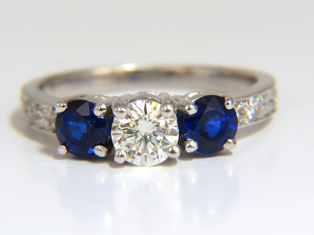 1.85ct NATURAL BLUE SAPPHIRE DIAMONDS RING 14KT CLASSIC THREE BEAD SET: Title: 1.85ct NATURAL BLUE SAPPHIRE DIAMONDS RING 14KT CLASSIC THREE BEAD SET Description: Ladies round shaped sapphires ring, three stone classic .50ct. Center Diamond. Round, Full cut Brilliant 5.1m