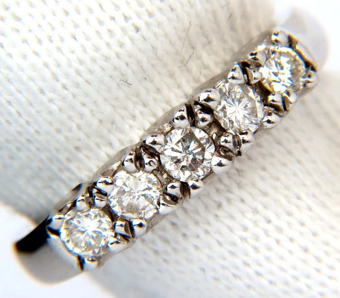 .55CT NATURAL DIAMONDS RING CLASSIC BAND 14KT H/VS: Title: .55CT NATURAL DIAMONDS RING CLASSIC BAND 14KT H/VS Description: Modern Band .55ct. Round natural diamonds ring H-color Vs-2 clarity 4.21mm wide size: 6 3.9 grams can resize, please inquire $380