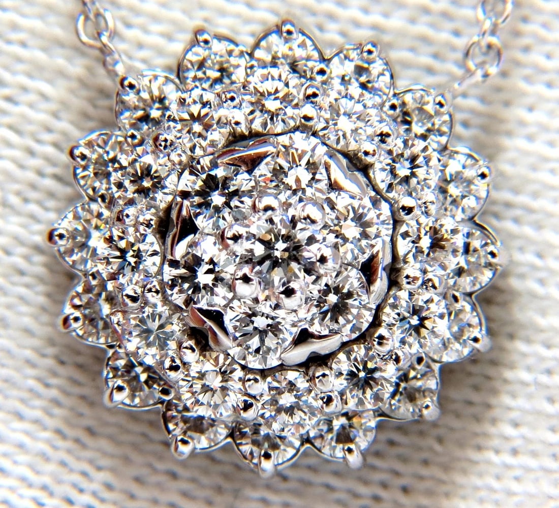 1.50ct diamonds halo cluster necklace 14kt. G/VS: Title: 1.50ct diamonds halo cluster necklace 14kt. G/VS Description: Halo diamond cluster Necklace 1.50ct. Natural diamonds Full cut round brilliant Vs-2 Clarity. G-color 14kt. white gold. cluster