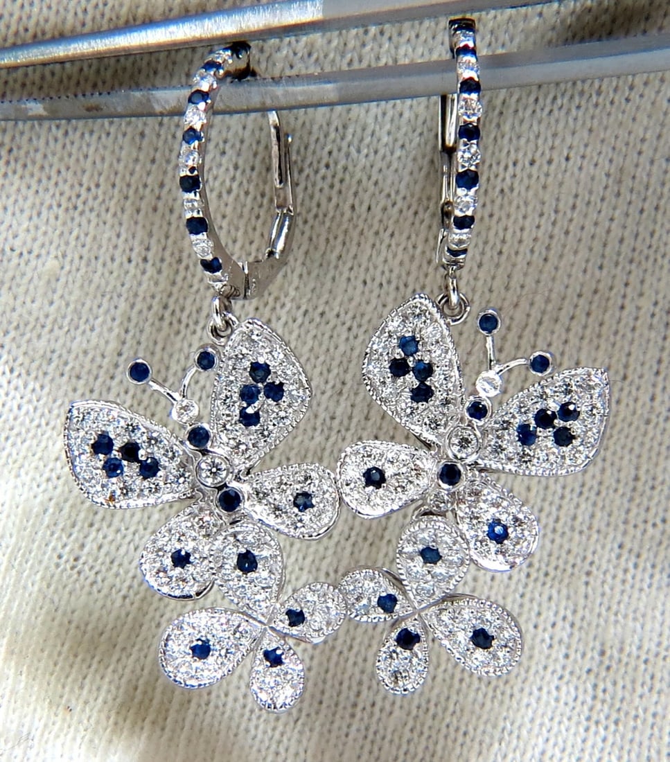 1.90ct Natural Sapphire Diamond Butterfly Dangle Earrings 14kt: Title: 1.90ct Natural Sapphire Diamond Butterfly Dangle Earrings 14kt Description: .70ct. Natural Sapphires & 1.20ct. diamonds dangle butterfly earrings. Sapphires: round cut, transparent & clean clar