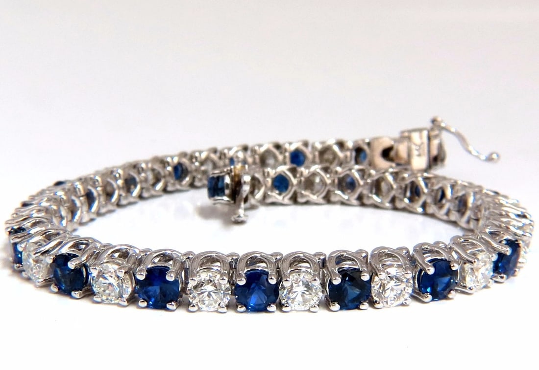 14.35ct natural Vivid royal blue round sapphires diamond bracelet 14kt tennis: Title: 14.35ct natural Vivid royal blue round sapphires diamond bracelet 14kt tennis Description: Calibrated Royal Blues. 8.11ct. Natural Blue Sapphires & 6.24ct Diamonds bracelet. Full Round cuts, gr