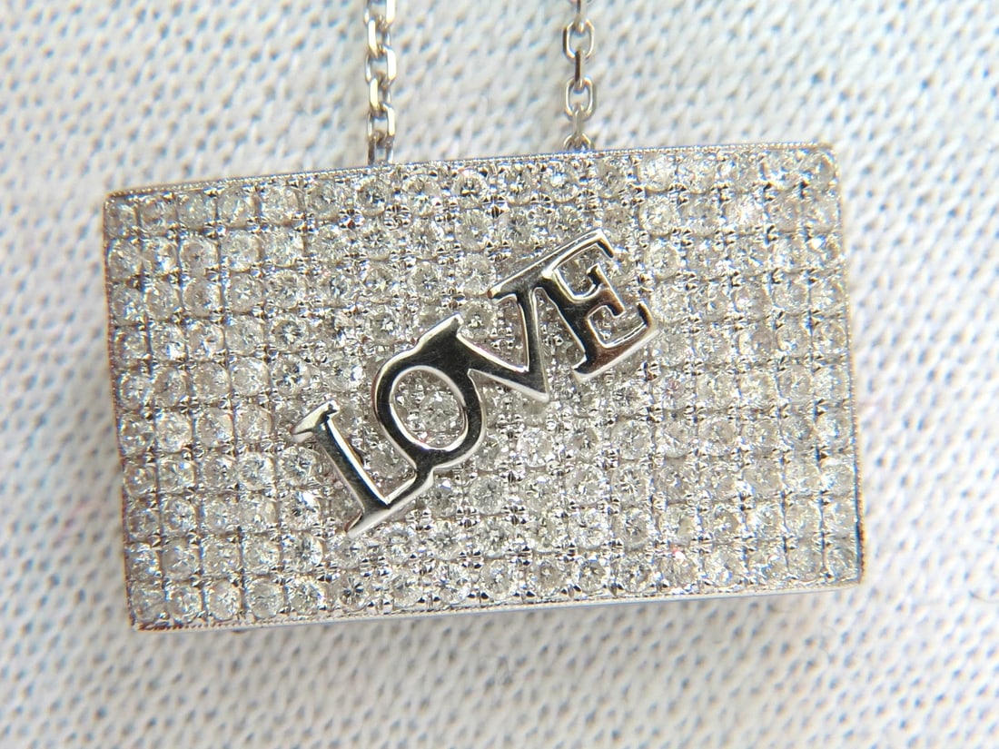 1.52CT DIAMoNDS MODERN "LOVE" DIAMONDS PENDANT 14KT & CHAIN BEAD SET+: Title: 1.52CT DIAMoNDS MODERN "LOVE" DIAMONDS PENDANT 14KT & CHAIN BEAD SET+ Description: ONLY MAGNIFICENT JEWELS Loves & Sparkles. 1.52ct. diamonds "Love" pendant. H-color, Si-1 clarity By hand,